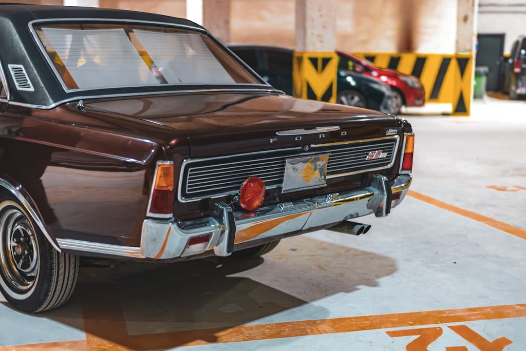 A dusty vintage car before detailing