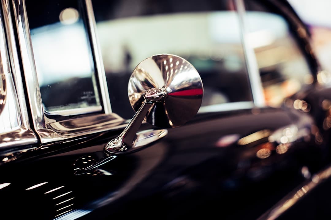 Close-up of a chrome vehicle side mirror