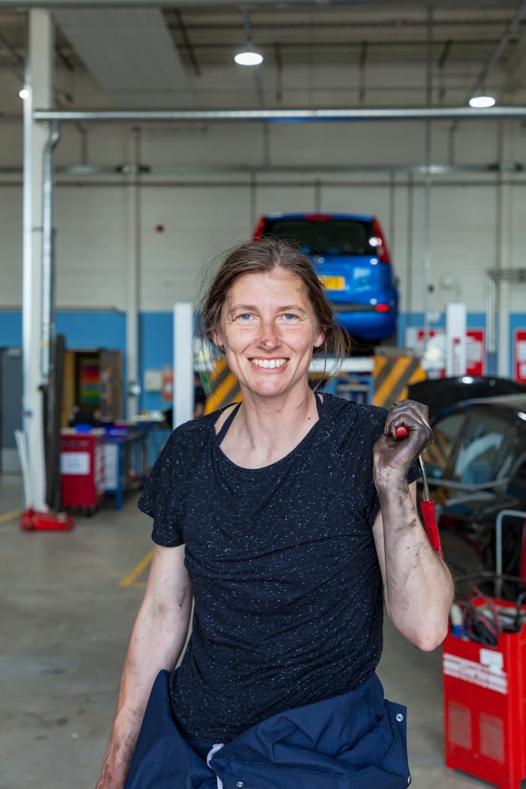 Marisol Reyes, the family behind Esperanza Detailing Co., in the bay her father built